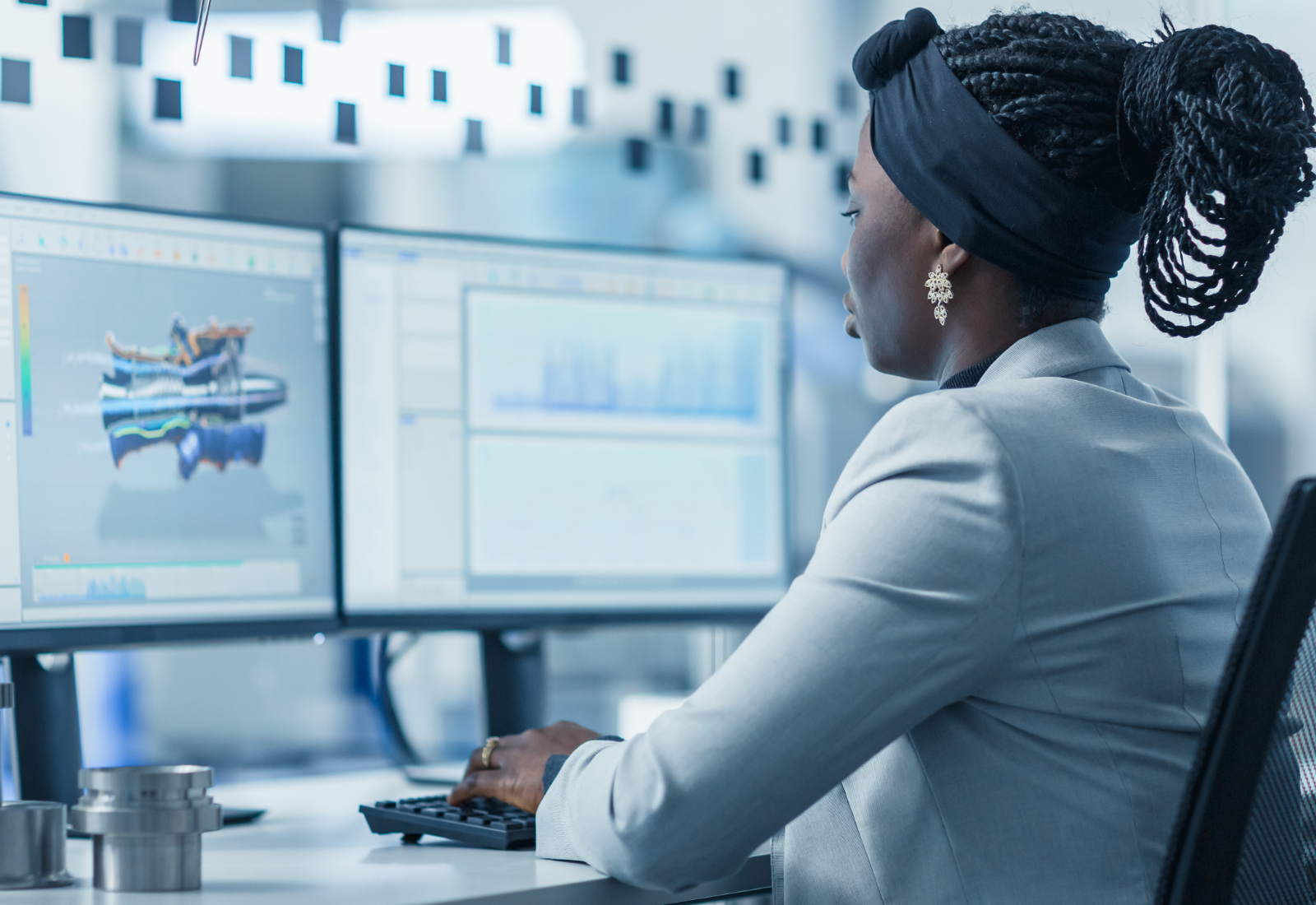 Image of a woman using a computer to send a secure fax