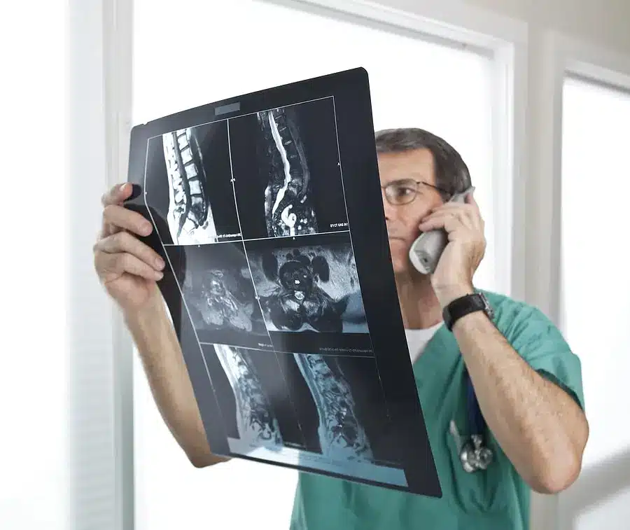 Image of a doctor looking at an X-ray